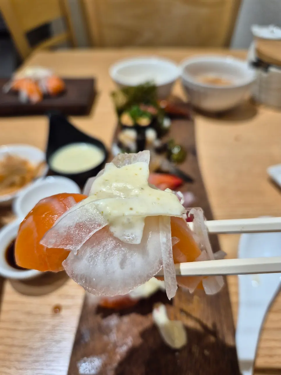 White fish sushi with a generous cut draped over the rice