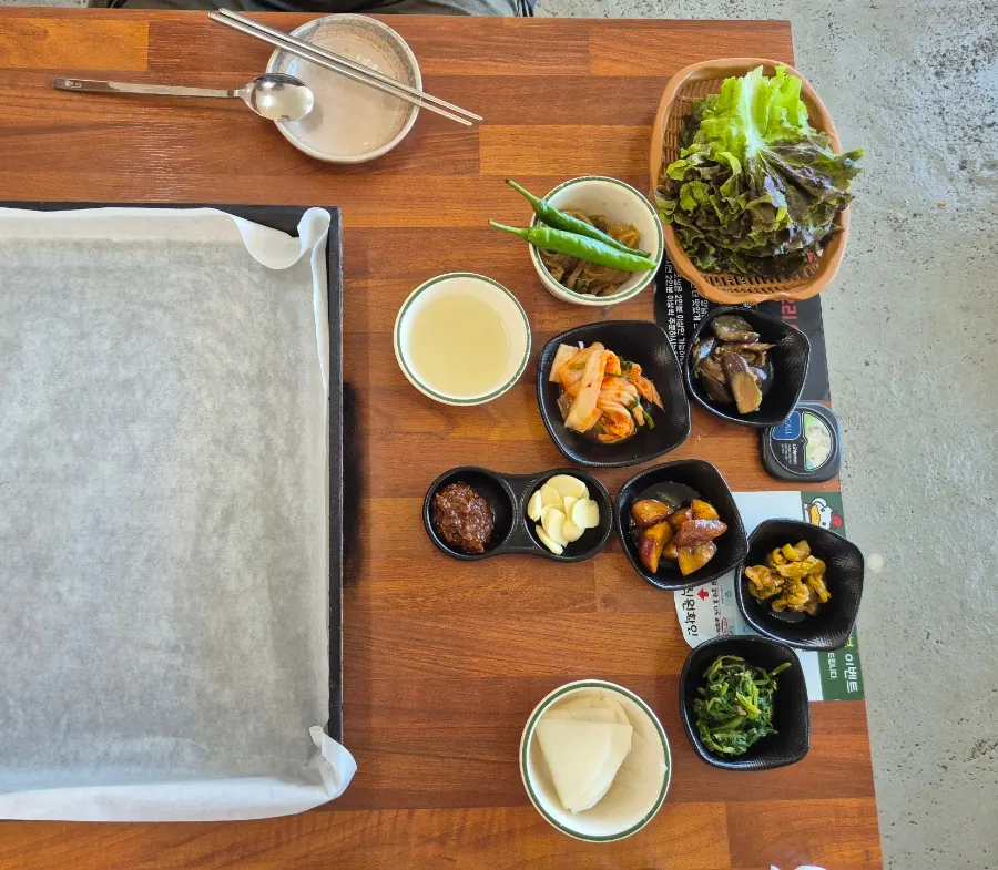 Table set with self-serve sides and basic side dishes