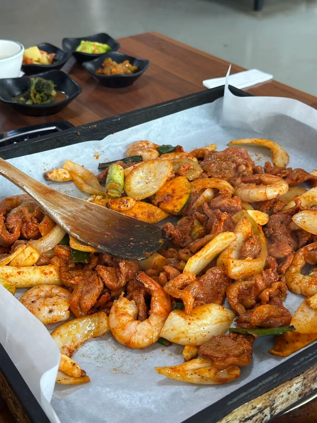 A large shrimp tucked among the duck jumulleok