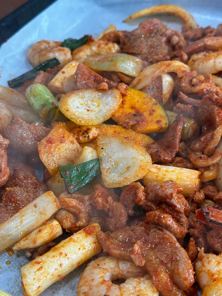 Plump shrimp visible in the duck jumulleok