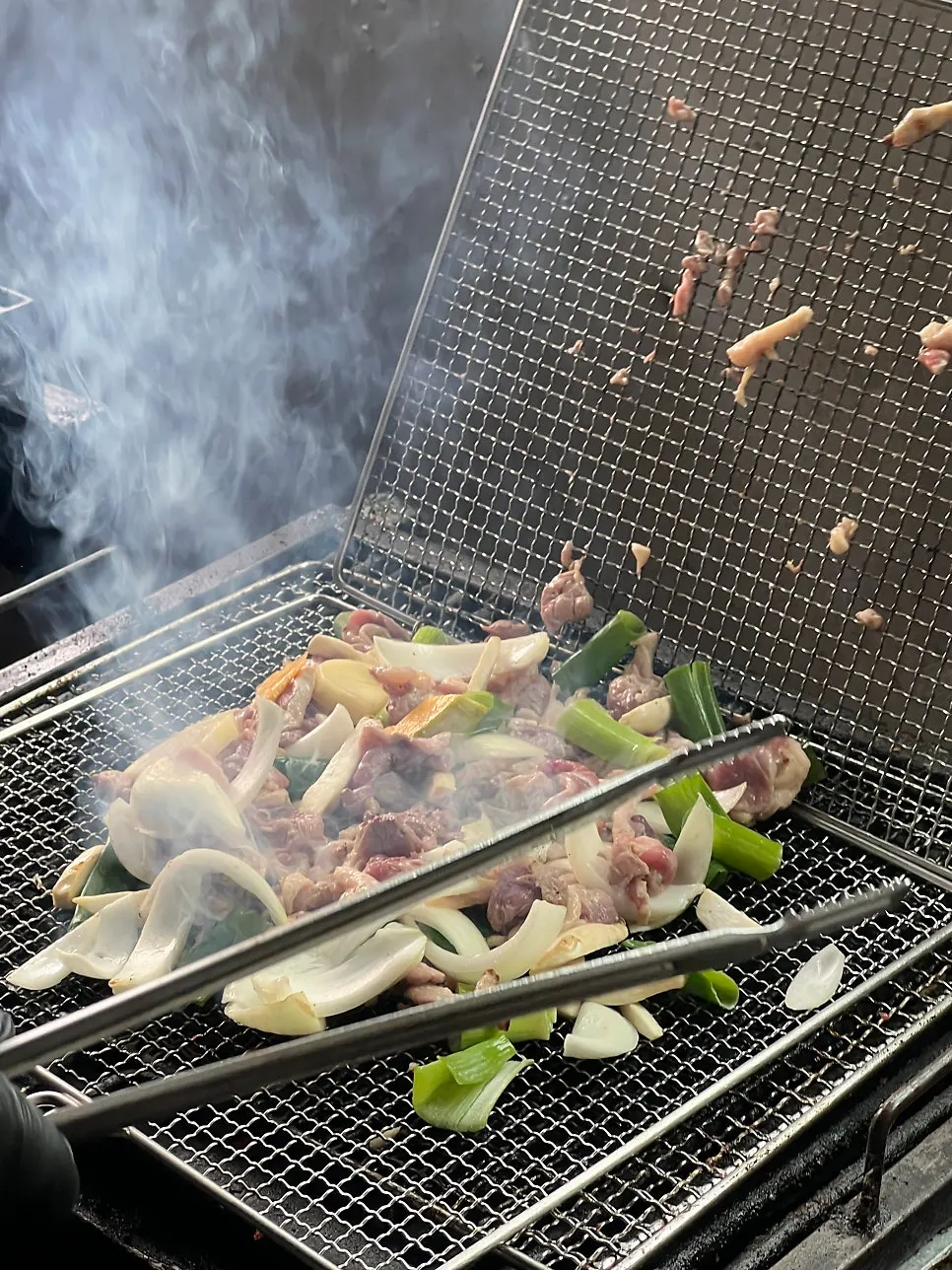 Duck roast pre-grilled over charcoal