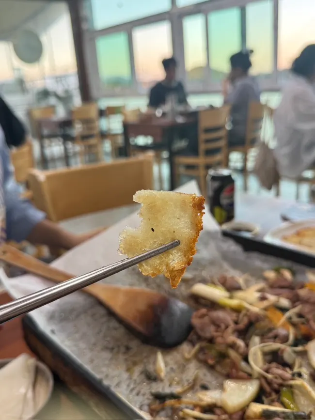 파김치를 올린 오리고기 한 입