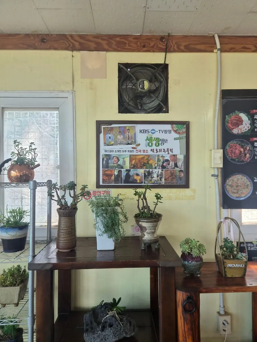 Corner of the restaurant with aprons and baby chairs ready