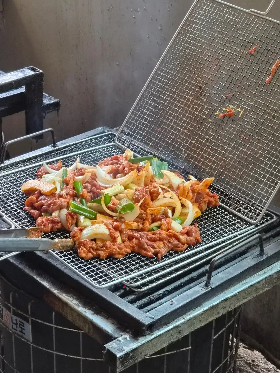 Close-up of duck jumulleok cooking