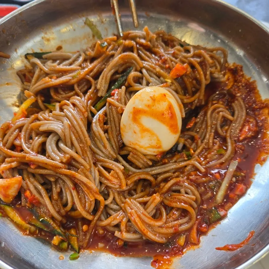 Close-up of the spicy sauce on bibim makguksu