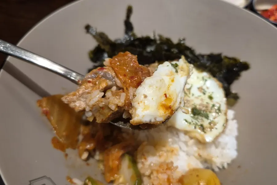 Rice bowl with sesame oil and seaweed flakes added