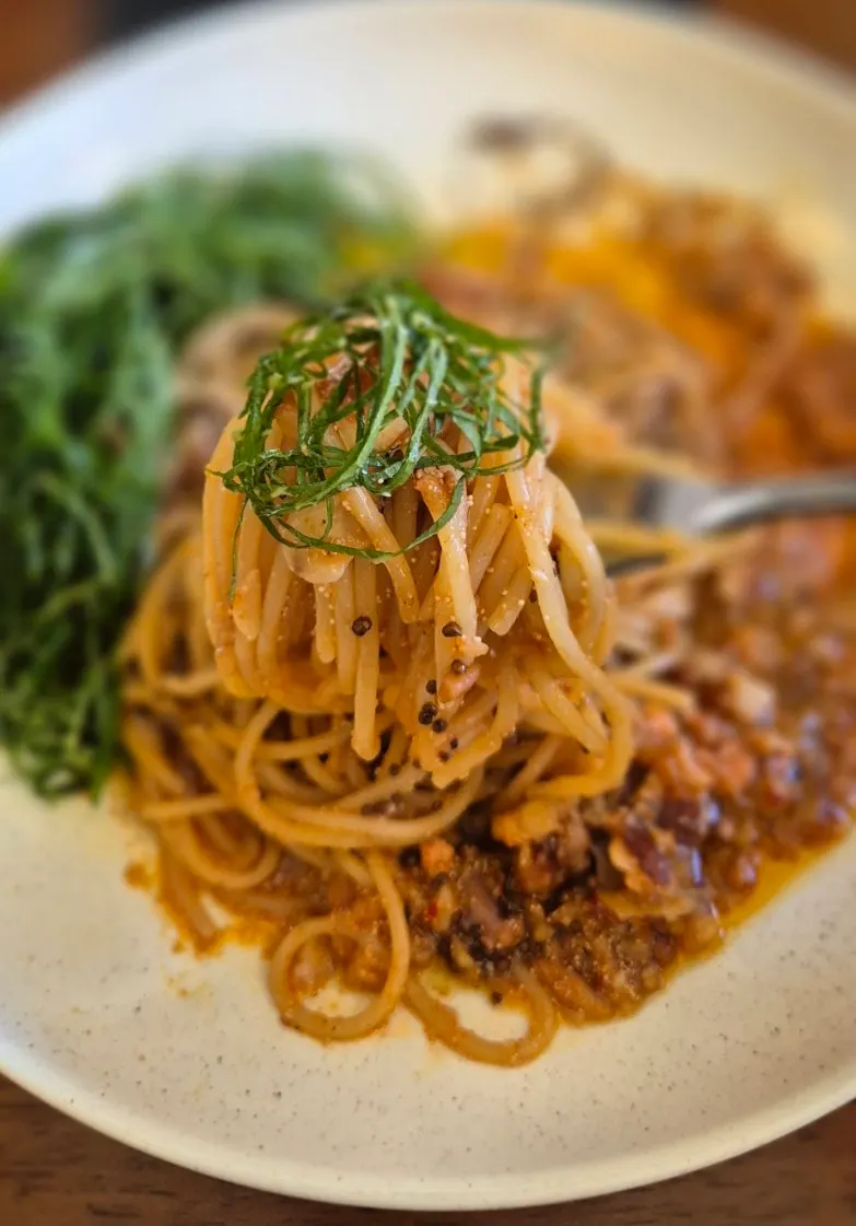 Close-up of the pasta topped with whole perilla seeds