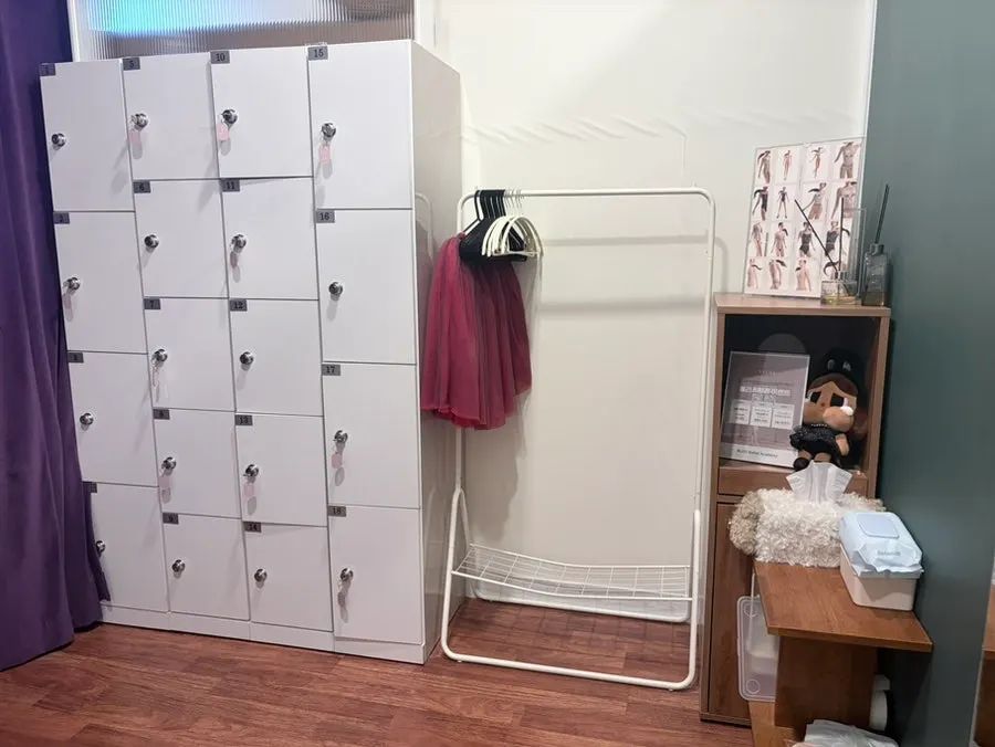 Practice room with full-length mirrors and barre