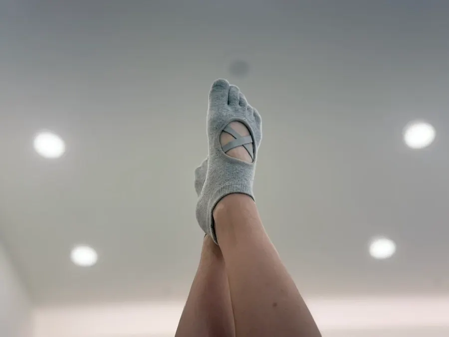 Learning basic ballet moves set to classical music