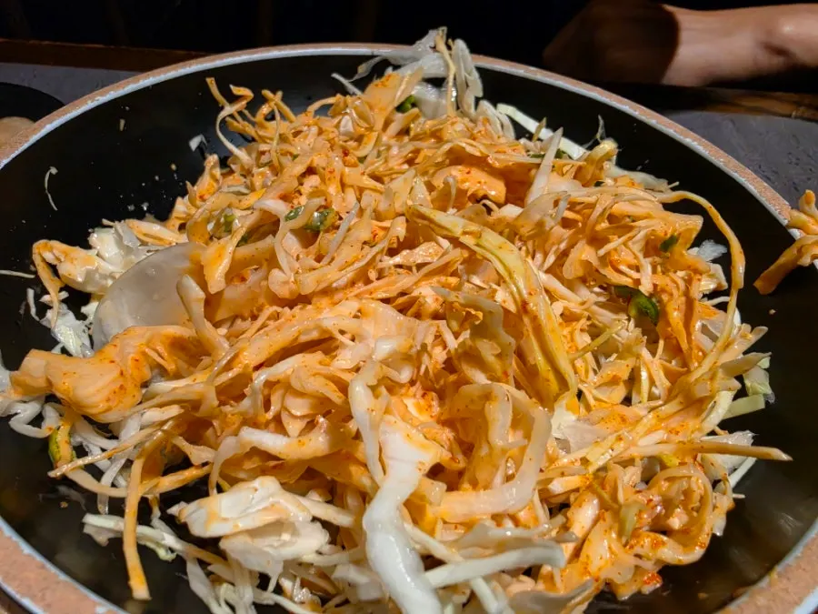 Duck wrapped into a bite-sized jeonbyeong wrap