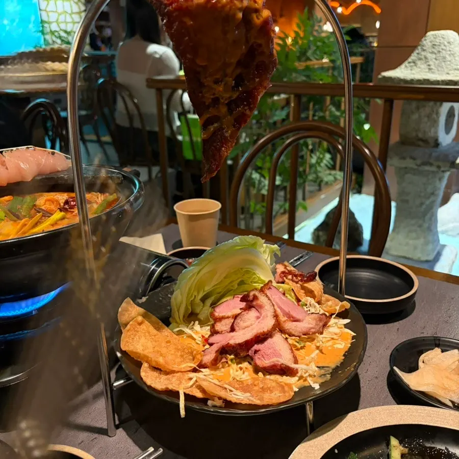 Mud duck jeonbyeong served with sauce and nacho chips