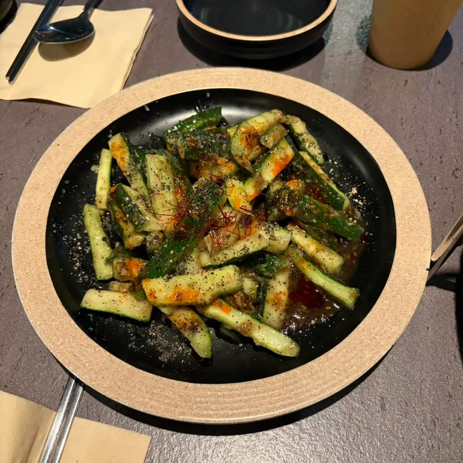 Plate of black sesame cucumber salad at Arigyegok
