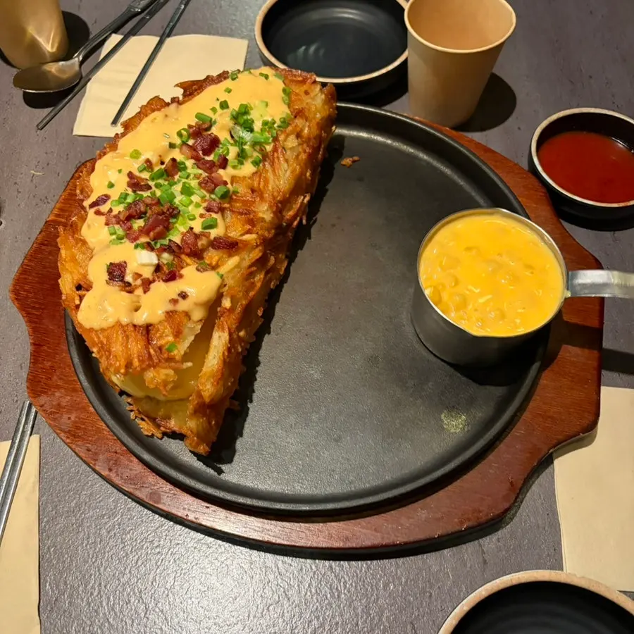 Cheesy potato pancake topped with corn cheese
