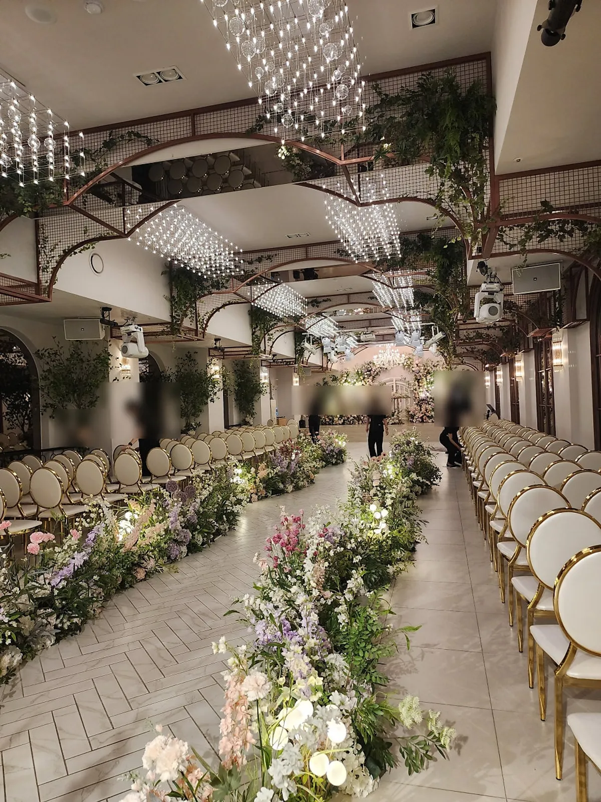 Wedding aisle richly decorated with flowers