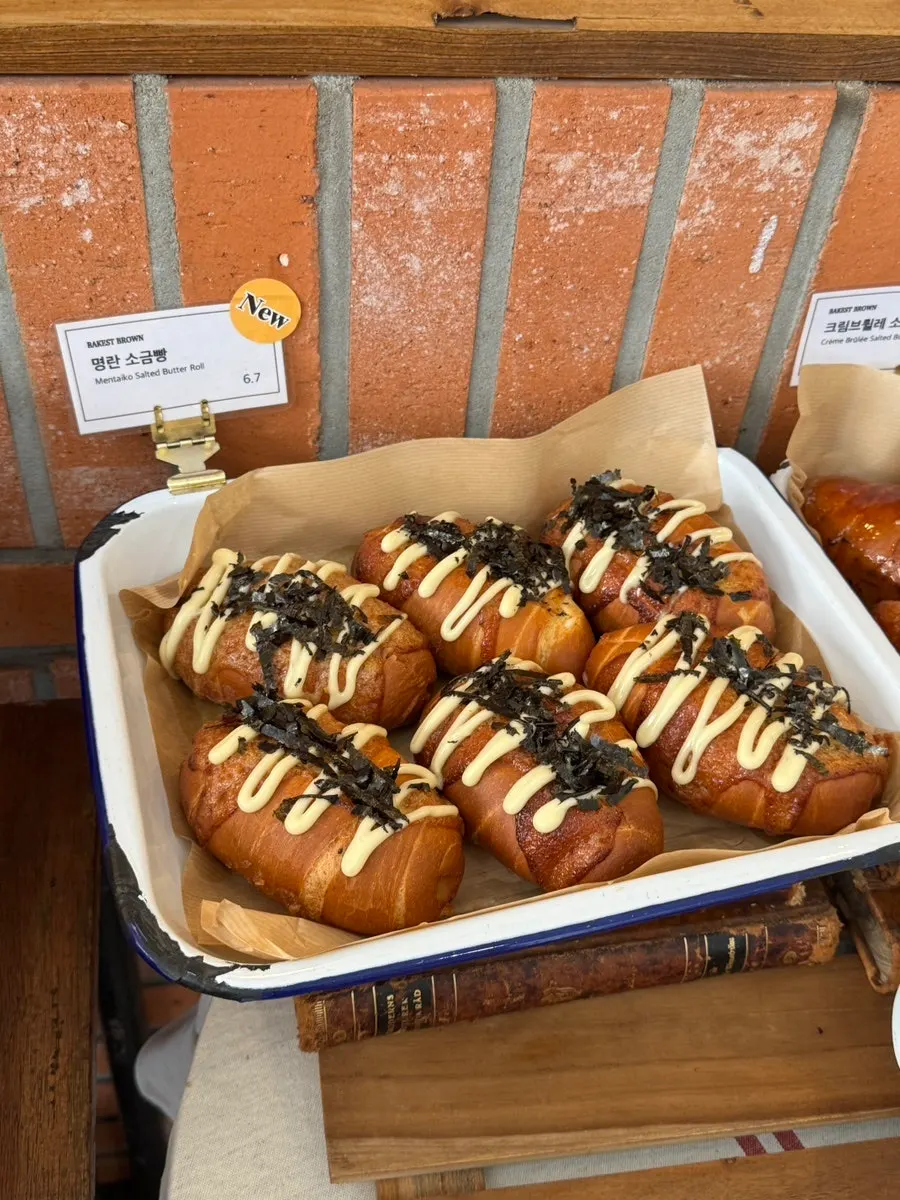 Basil cream cheese twist and salt bread on display