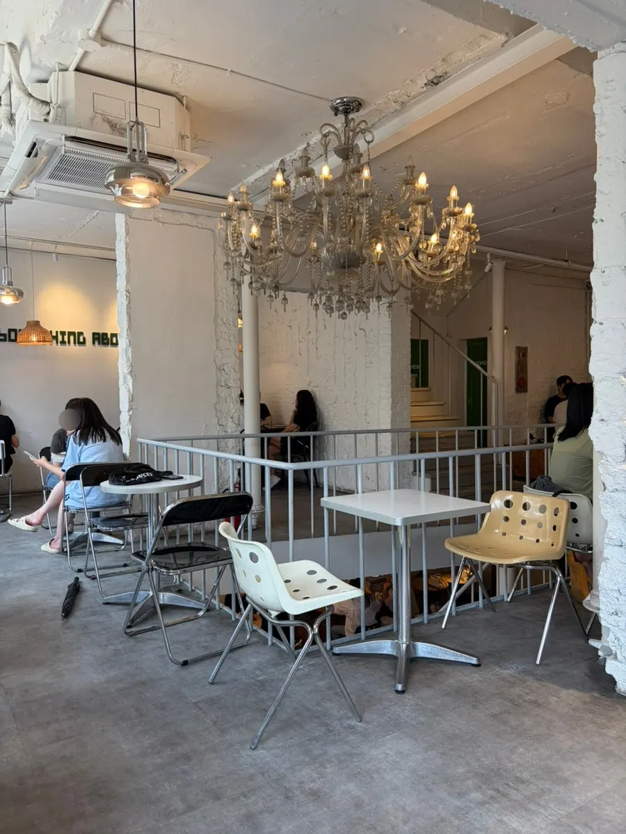 Warm café interior with chandeliers
