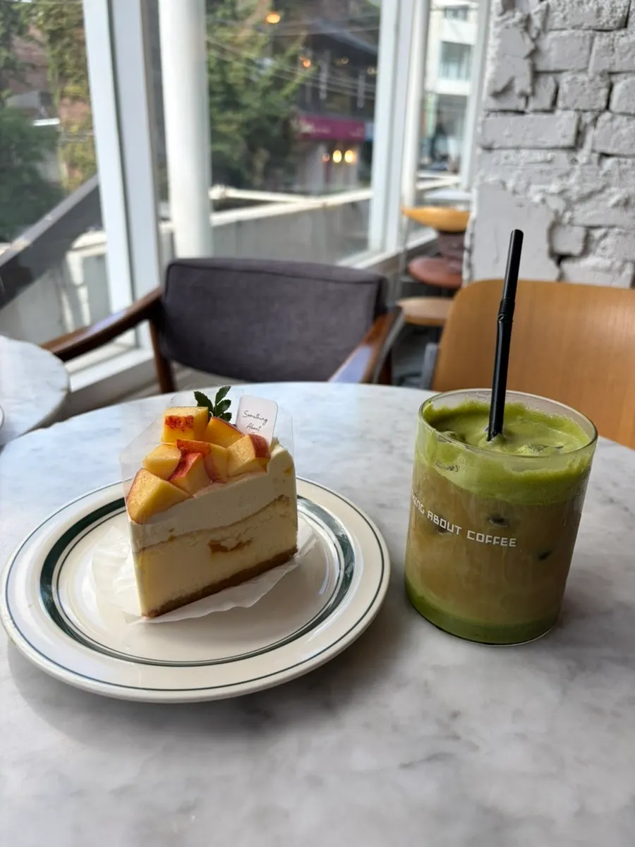 Table with matcha cream cold brew and desserts
