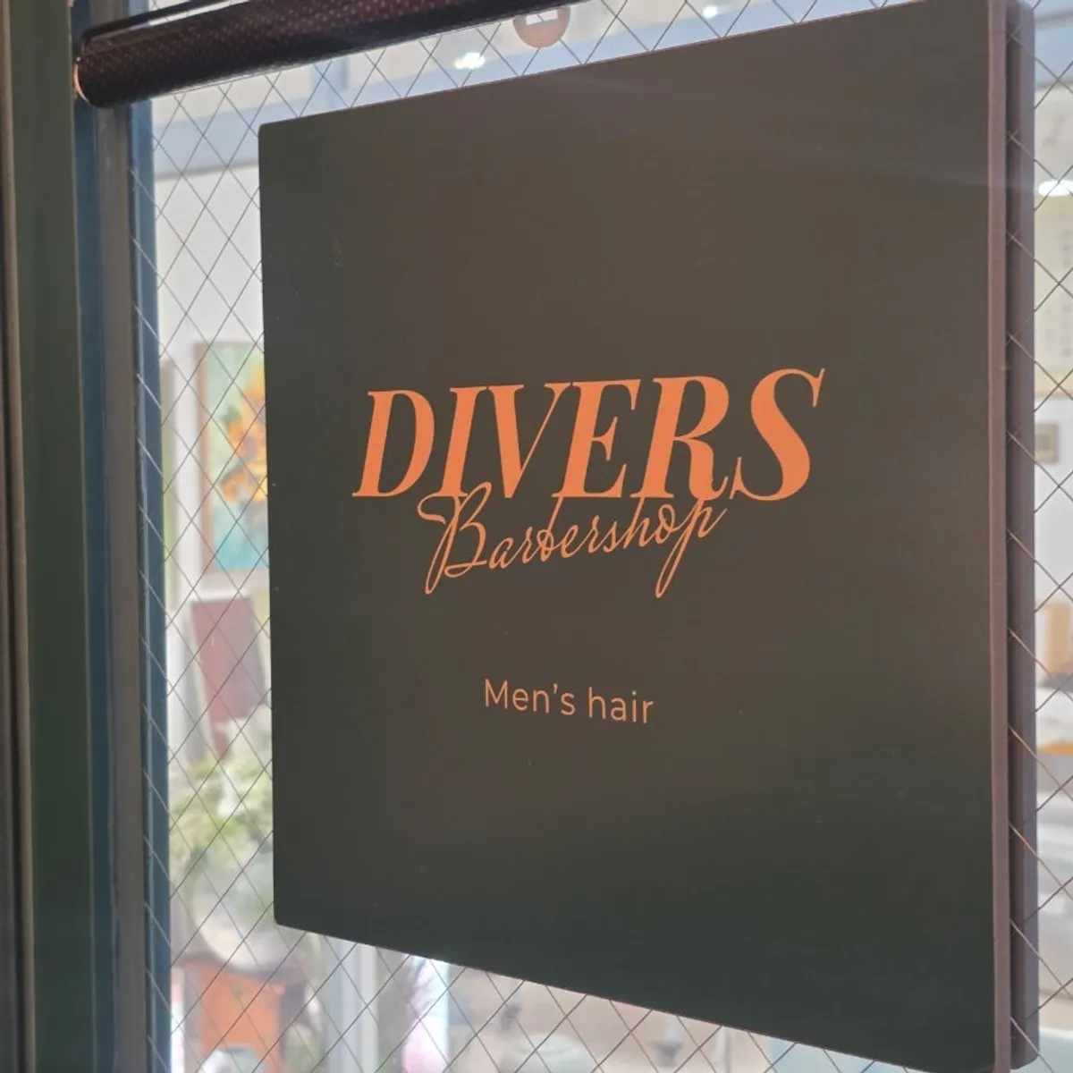 Divers Barbershop exterior inside the underground shopping arcade