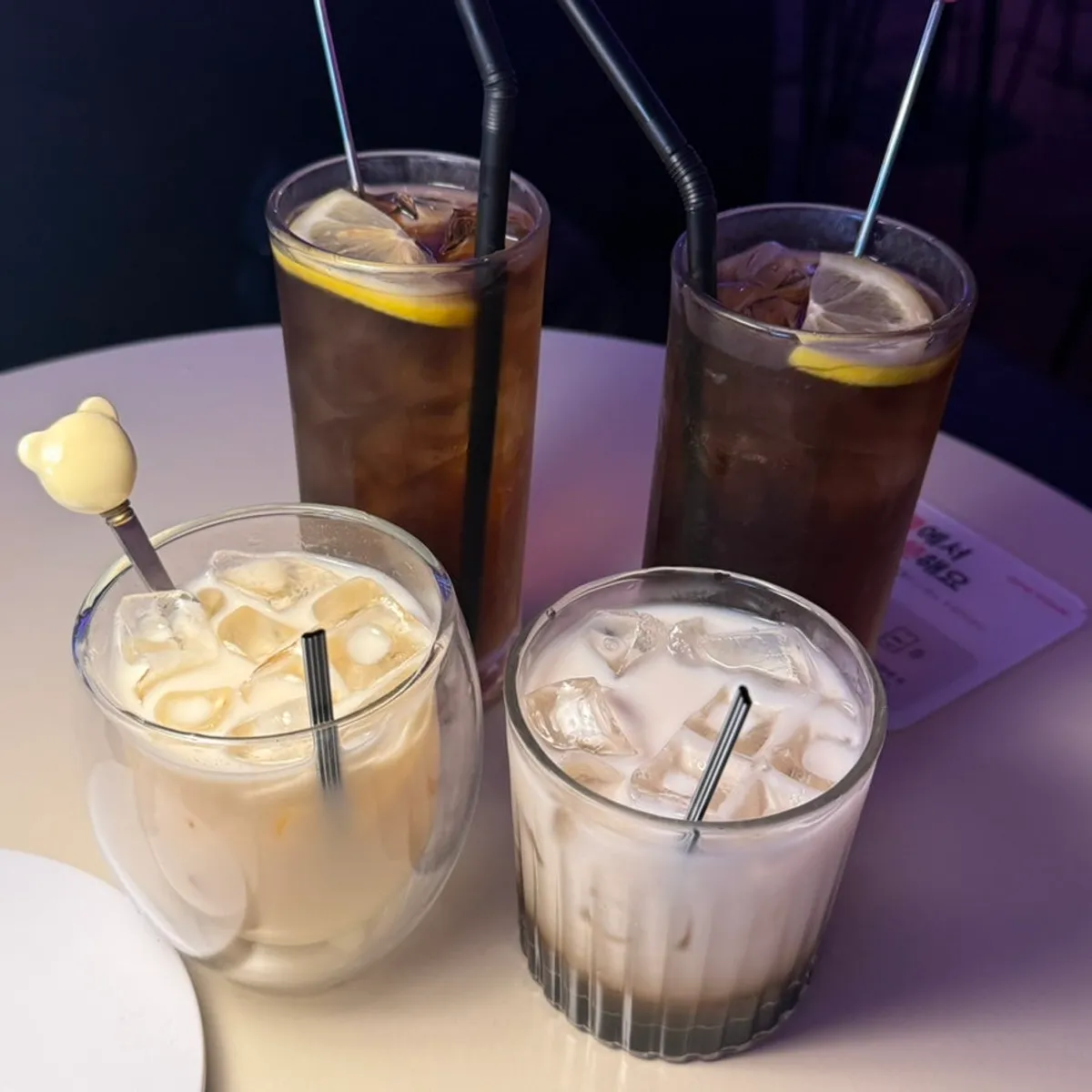Table with B LAB zero cola and a cocktail