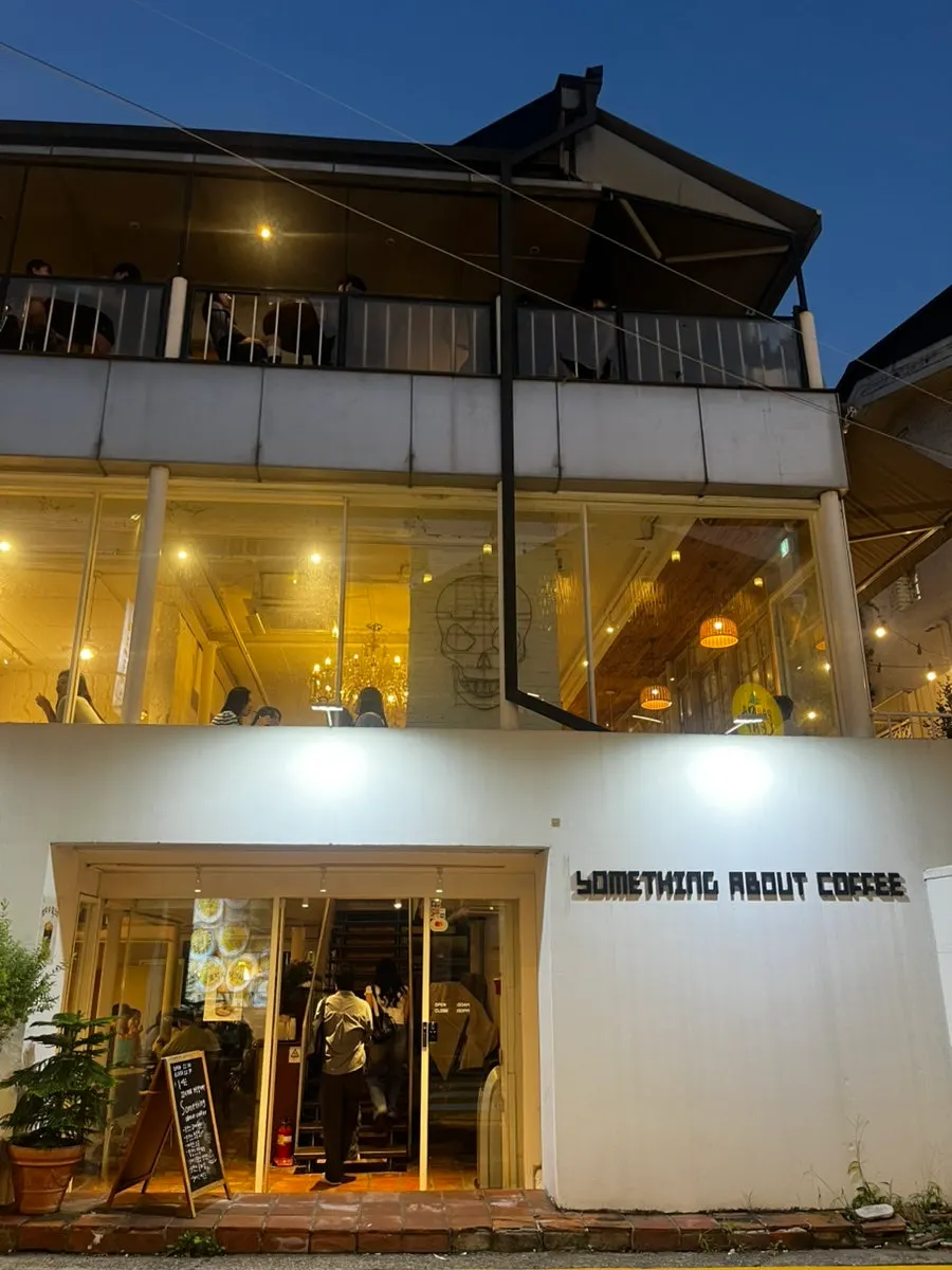 Exterior of the Something About Coffee building on a Gangnam-daero side street