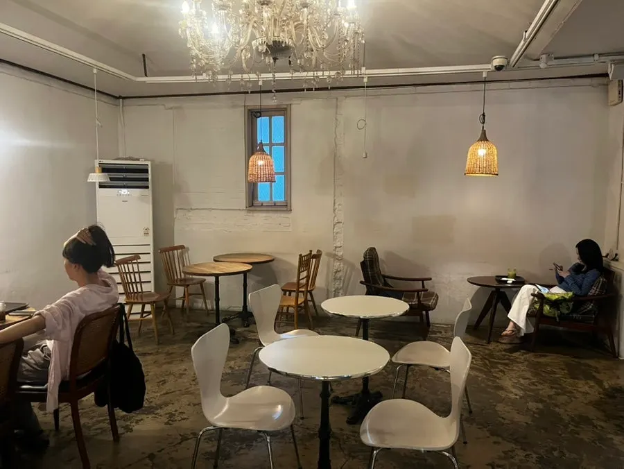 Interior seating on a floor with its own distinct mood in the large café