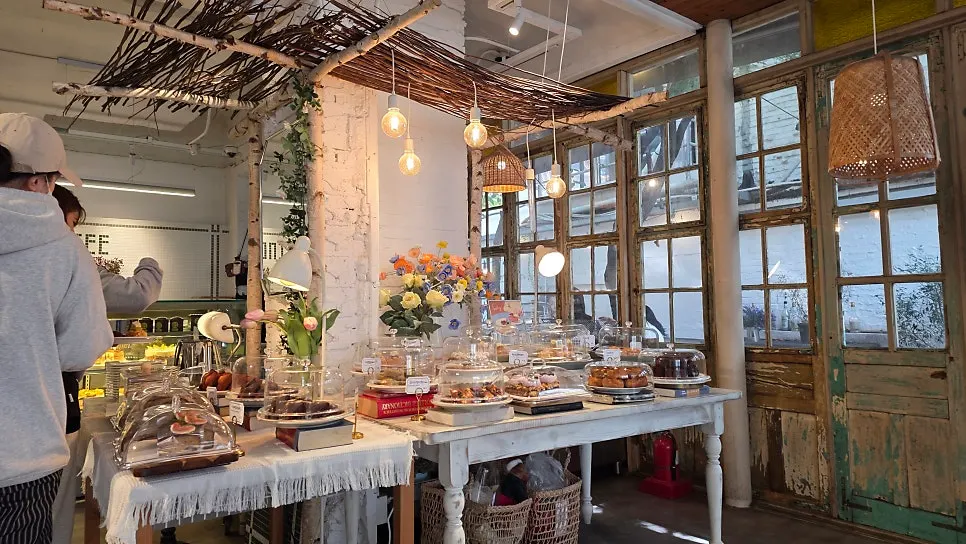 Cookies and scones displayed with flowers