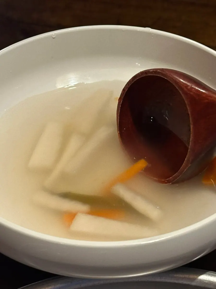 Kimchi and pickled radish among Bongu Hwarro's basic banchan
