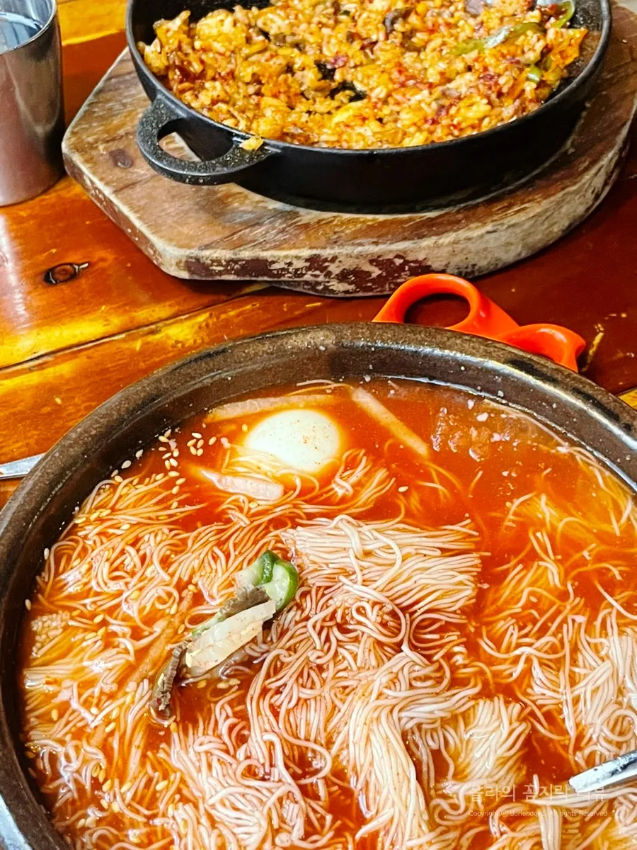 Close-up of the uniquely styled jar naengmyeon