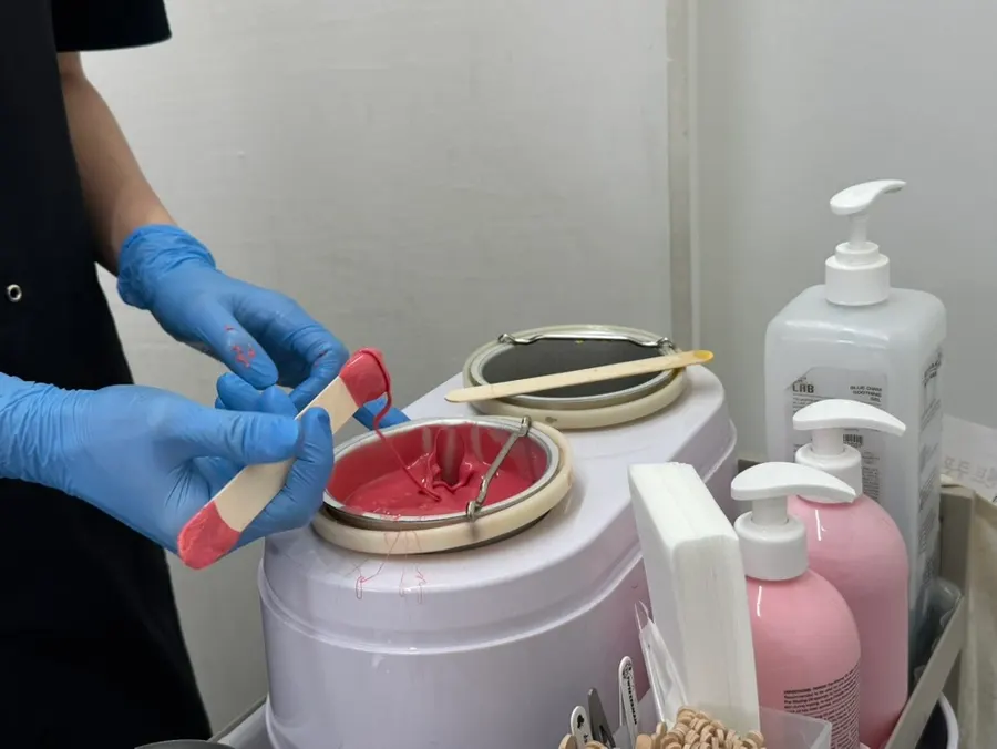 Preparation for the Brazilian waxing treatment