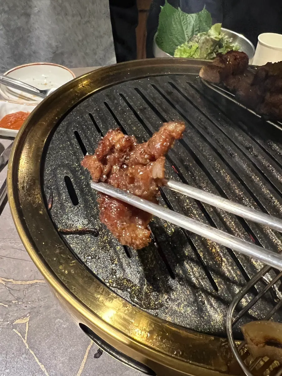 Pork cooking on the grill
