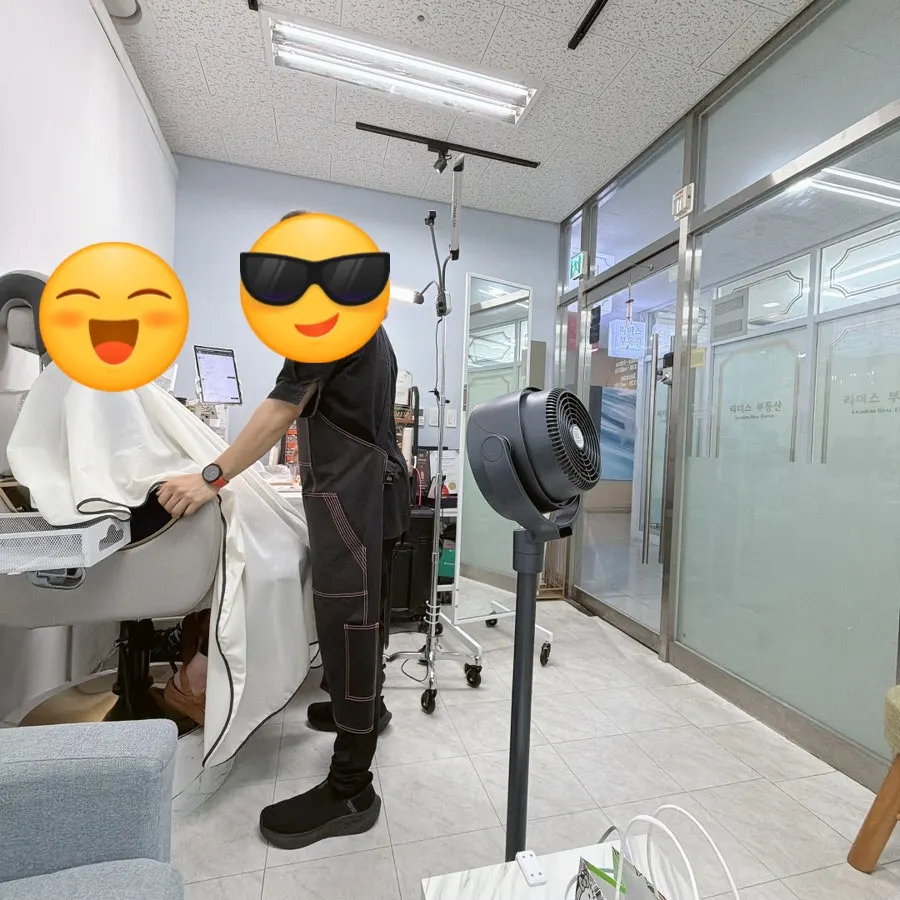 Seated in the treatment chair during eyebrow grooming