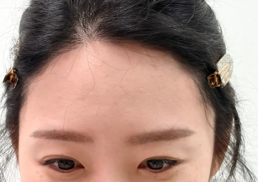 Finished look after eyebrow grooming and makeup