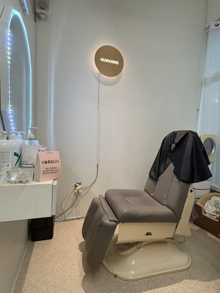 Eyebrow waxing scene tidying up the brow line