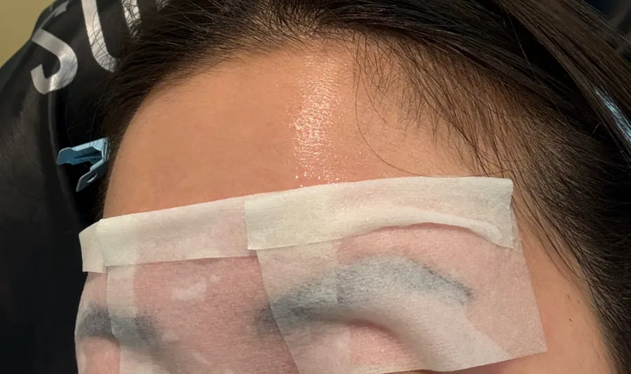 Close-up of eyebrows after waxing and brow lift
