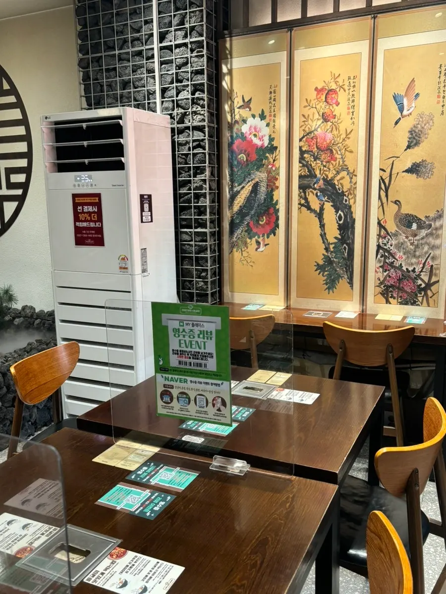 Interior of 1992 Deopbap & Jjageuli Gangnam Main Branch with a traditional feel