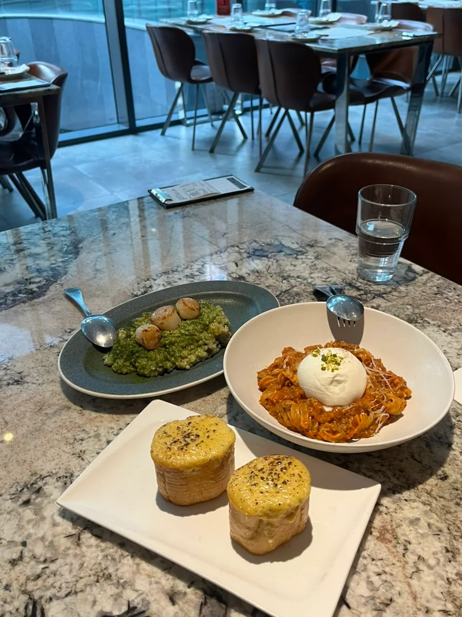 Burrata pasta and seafood barley risotto