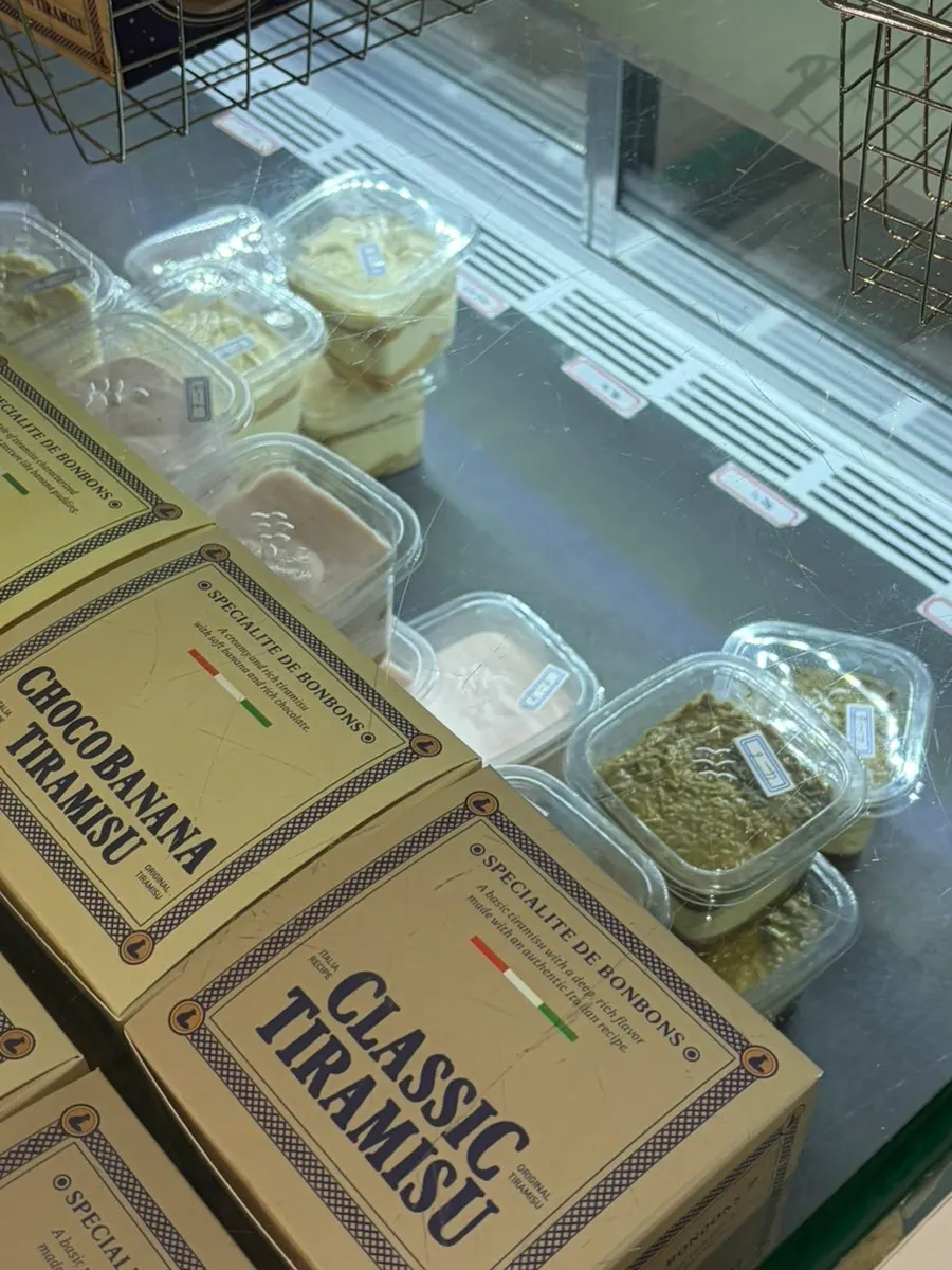 Sign listing the expanded tiramisu menu