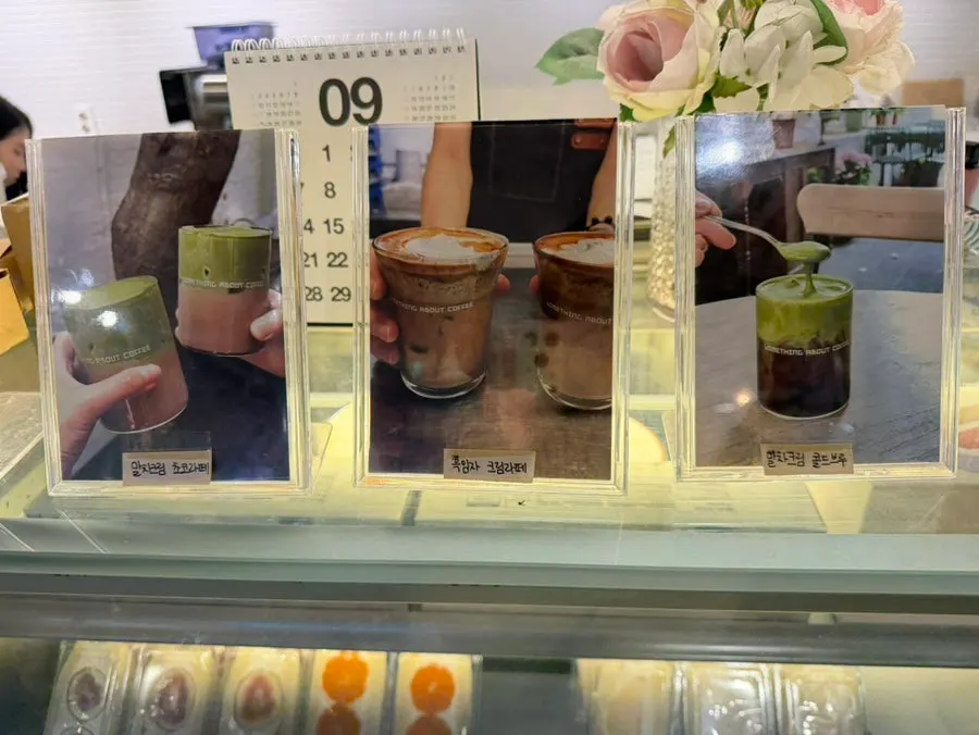 Various cakes displayed in the showcase