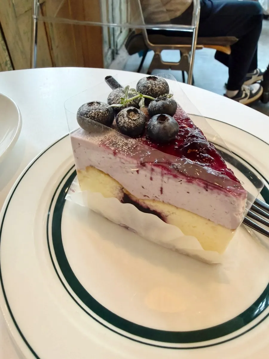 Cheesecake piled high with fresh blueberries