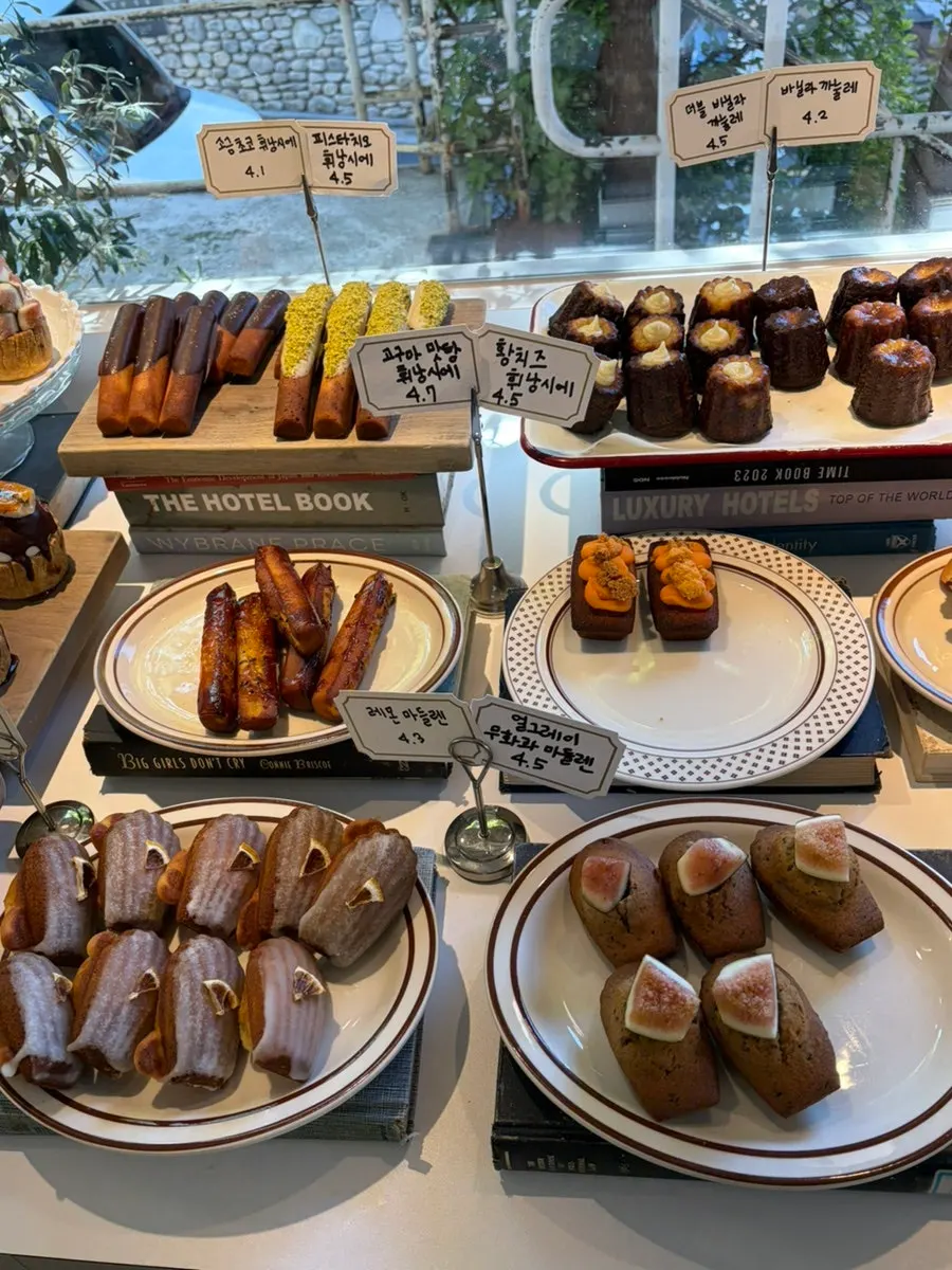 Madeleines, flans and other desserts on display