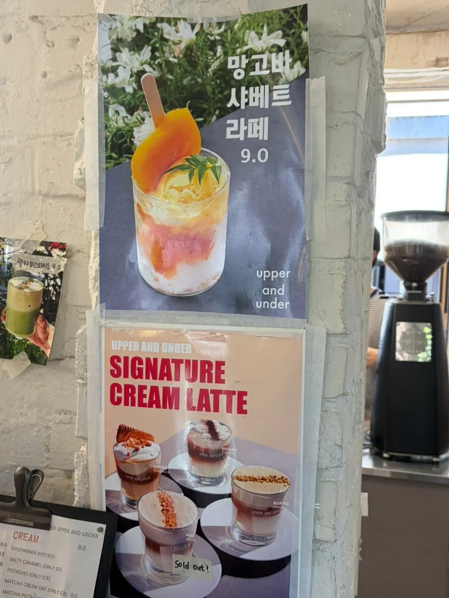 Menu listing the signature cream latte