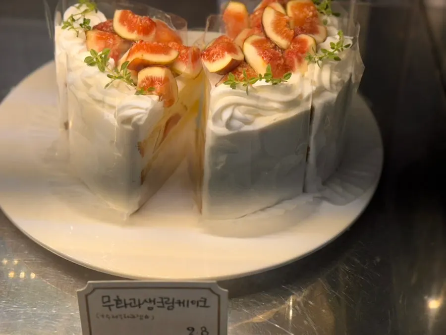 Cakes and baked goods displayed in the showcase
