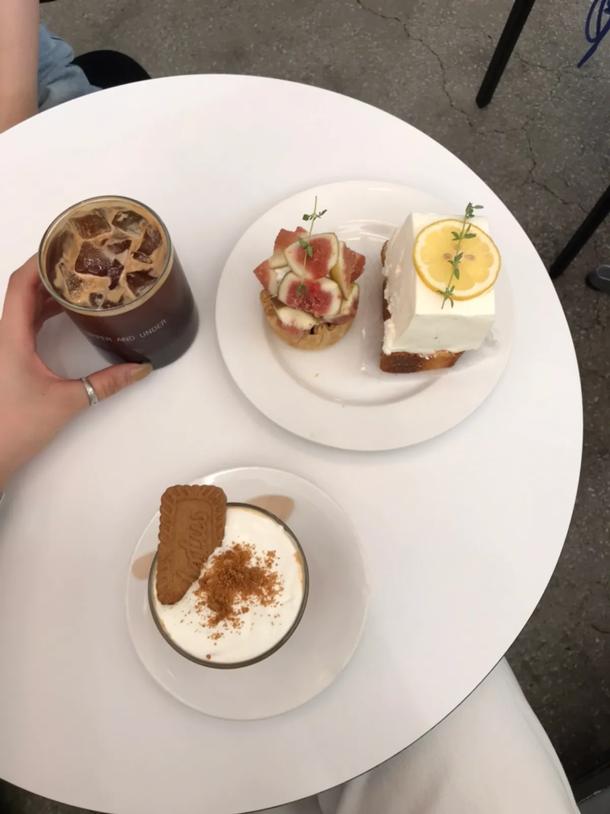 Table with salty caramel cream latte, fig pie, and lemon slice cake