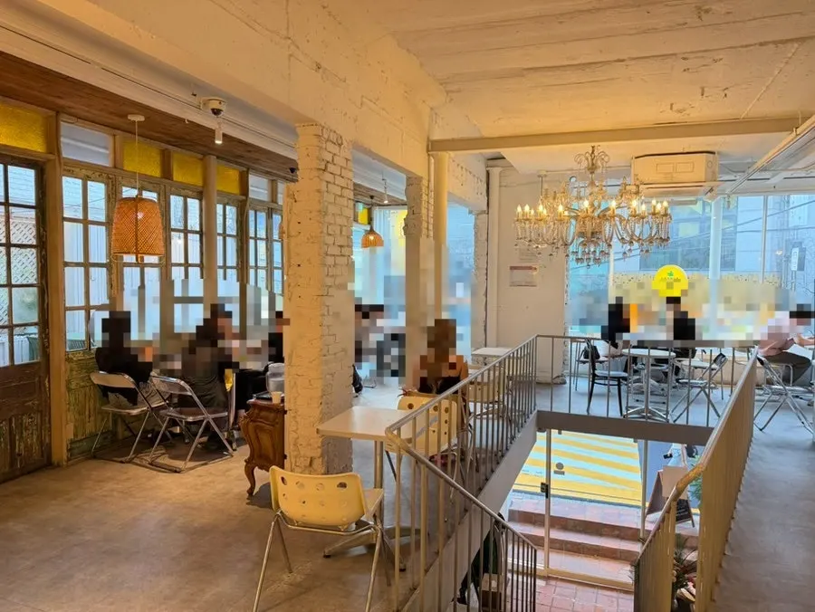 Interior view of the 1st floor of Something About Coffee
