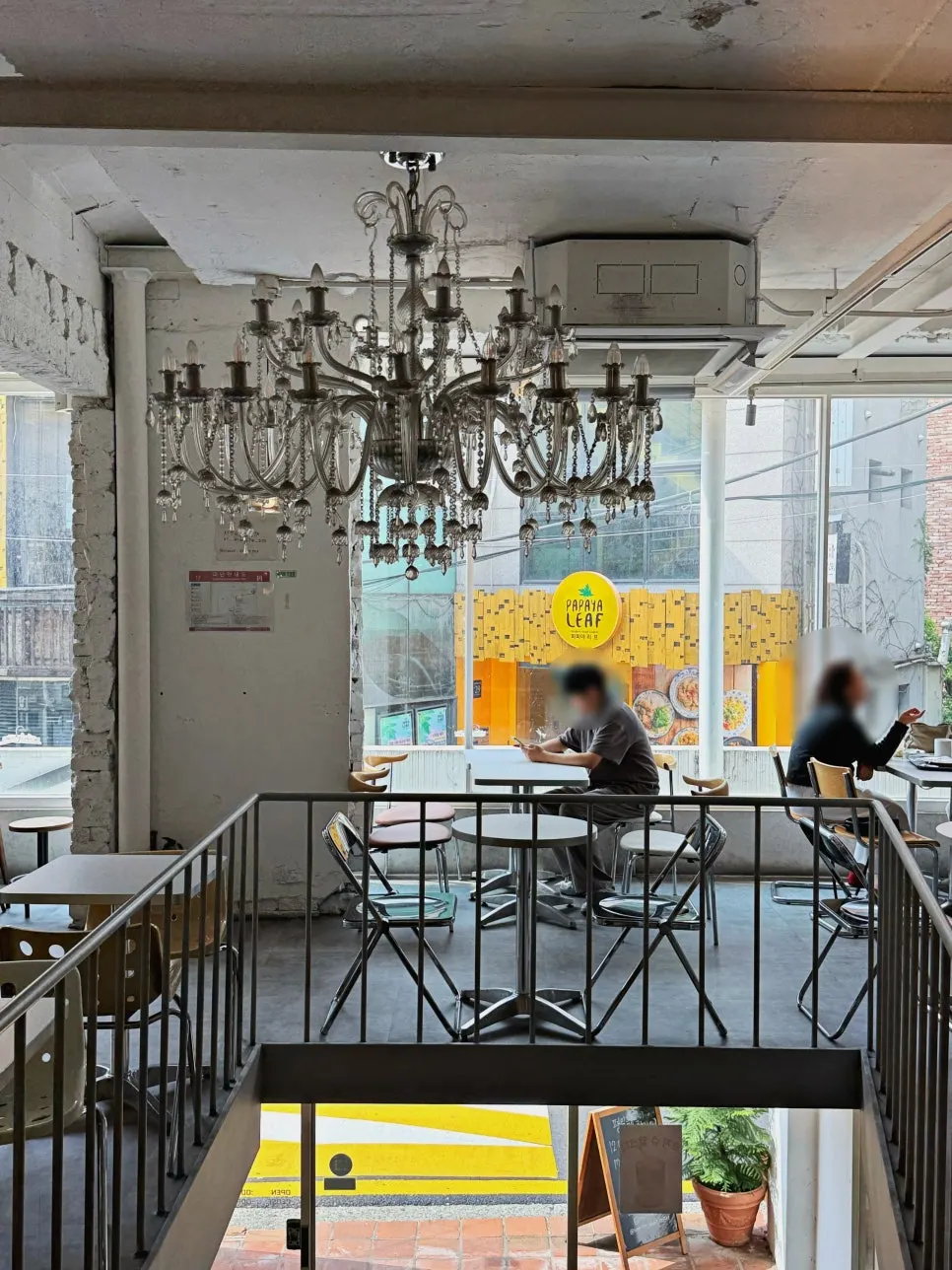 High-ceilinged window seats on the 2nd floor of Something About Coffee