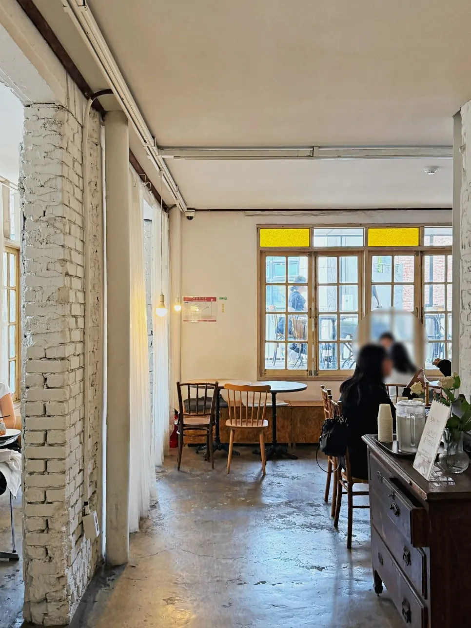 Calm seating area on the 3rd floor of Something About Coffee