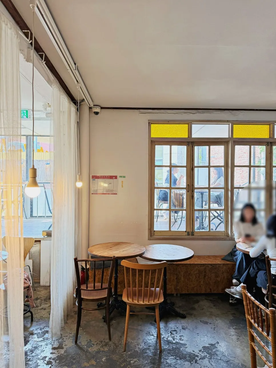 Warm-toned interior concept on the 3rd floor of Something About Coffee
