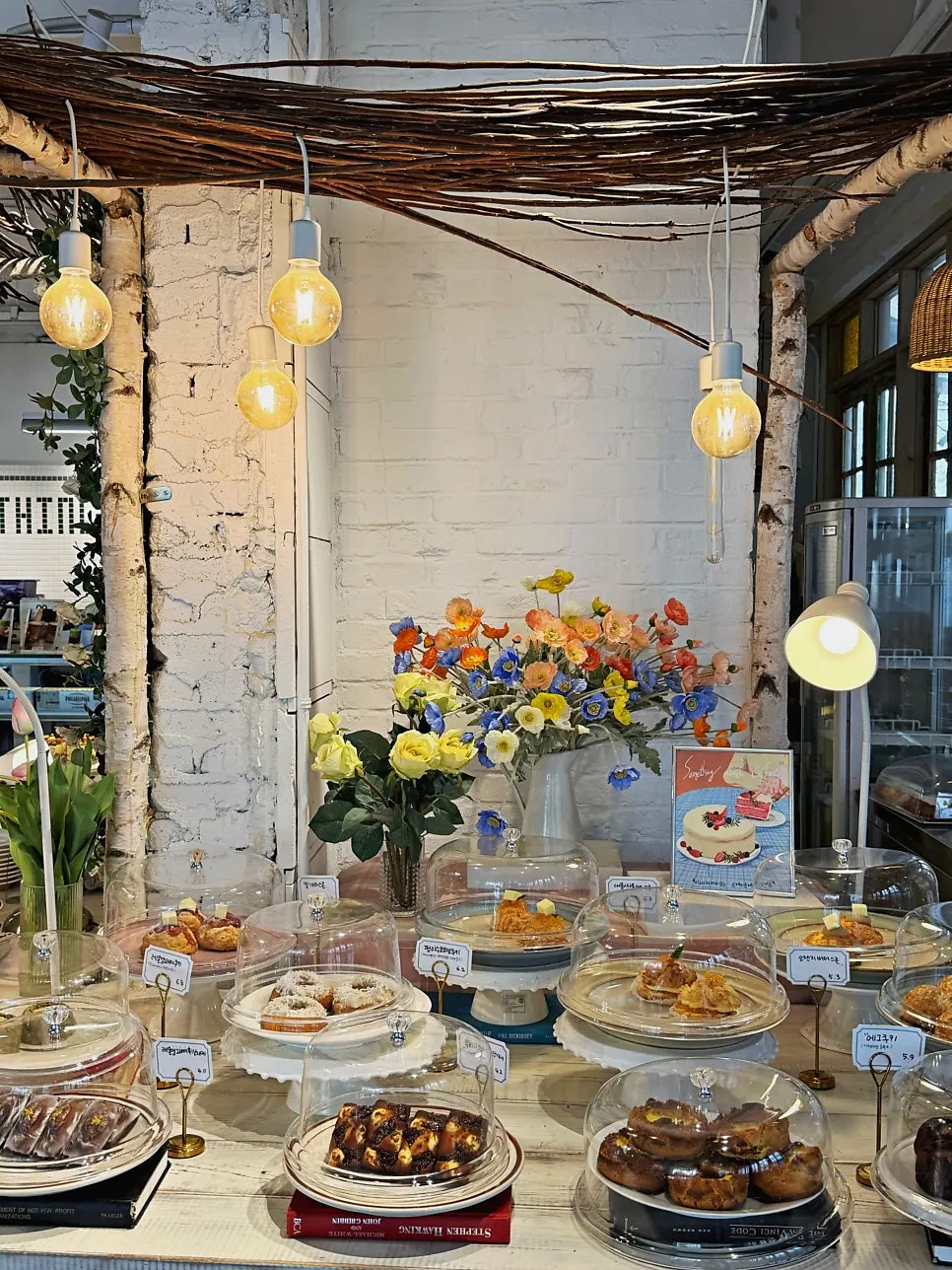 Display case with an assortment of financiers and cookies