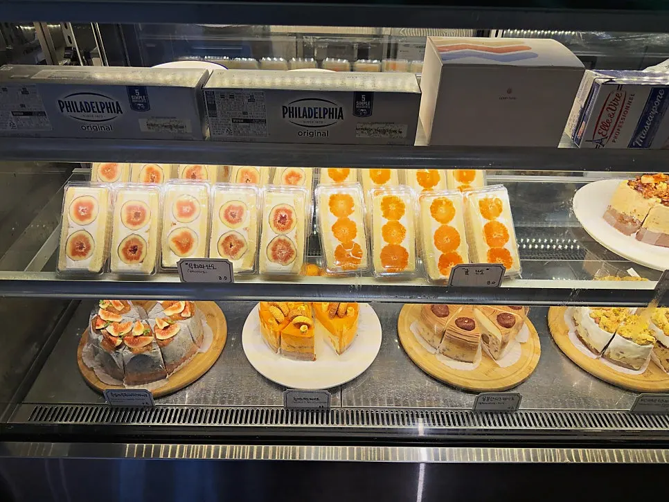 Slices of cake displayed in the showcase