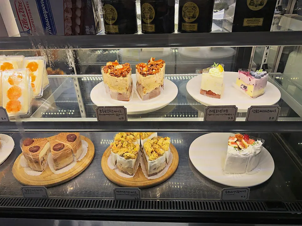 Close-up of the cake showcase at Something About Coffee